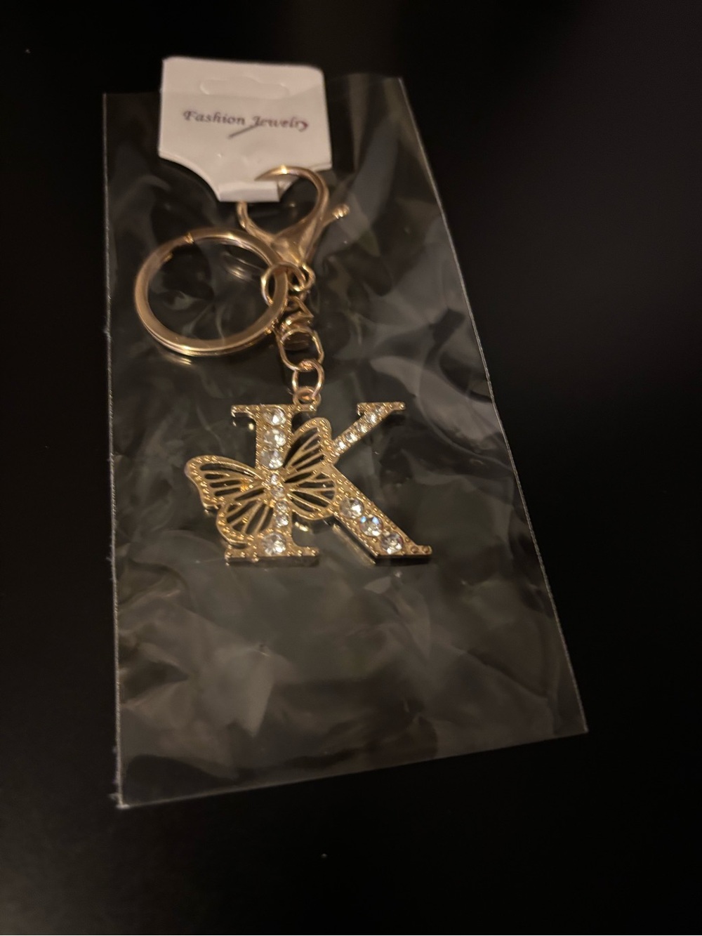 Gold 'K' Initial Keychain with Butterfly Accent